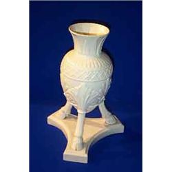 A BELLEEK "AMPHORA" VASE, FIRST PERIOD, (1863-1890), raised on clover feet on a triform base, 3...