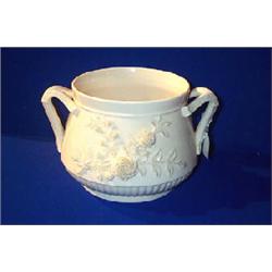 A BELLEEK "FINNER JARDINIERE", THIRD PERIOD, (1926-1946), with twin harp handles and flower encru...