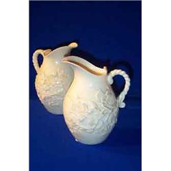 A BELLEEK IVY ENCRUSTED MILK JUG, FIRST PERIOD, (1863-1890), black printed mark, 16cms high; and...