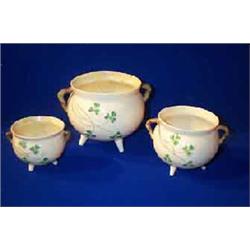 THREE BELLEEK SKILLETS, SECOND PERIOD, (1891-1926), with coloured shamrocks....