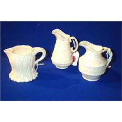 A BELLEEK "AMPANIDA" MILK JUG, FIRST PERIOD, (1863-1890), black printed mark, 10cms high; a Belle...