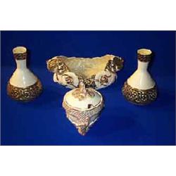A BELLEEK "CELTIC" FRUIT BOWL, SECOND PERIOD, (after 1926), two Celtic vases, third period; and a...