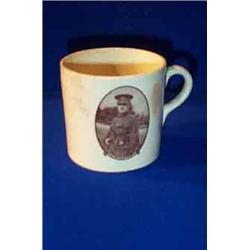 A RARE BELLEEK COMMEMORATIVE POTTERY MUG, SECOND PERIOD, (1891-1926), transfer printed photograph...
