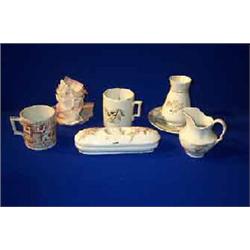 A QUANTITY OF BELLEEK, SECOND and THIRD PERIOD, pottery items including mugs; soup dish holders;...