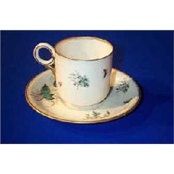 A BELLEEK "CONVOLVULUS" PATTERN TEA CUP AND COVER, enamelled in greens and greys with gilding, pr...