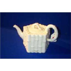 a belleek "bamboo" teapot, first period (1863-1890), moulded as lengths of bamboo, black printed...