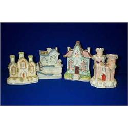 A COLLECTION OF FOUR STAFFORDSHIRE PASTILLE BURNERS, 19th CENTURY, in the form of cottages....