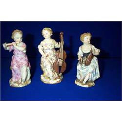 A COLLECTION OF THREE MEISSEN GROUPS, 19th CENTURY, of little girls playing musical instruments....