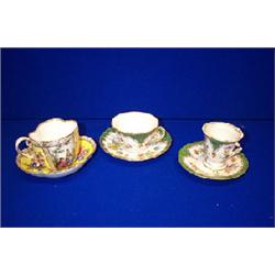 A MEISSEN CABINET CUP AND SAUCER, c.1900; and a pair of Dresden examples, mostly cracked (6)....