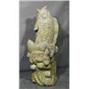 A LARGE ORIENTAL STONE CARVING OF AN UPRIGHT CARP,, 136cms high., €2000/3000, Illustration...