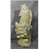 Image 1 : A LARGE ORIENTAL STONE CARVING OF AN UPRIGHT CARP,, 136cms high., €2000/3000, Illustration...