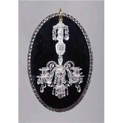 AN OVAL FACET CUT GLASS STUDDED MIRROR FRAME, IRISH, LATE 18th CENTURY, with a suspended three br...
