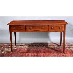 A MAHOGANY SIDE TABLE, c.1800, with plain rectangular top, the frieze fitted with three boxwood b...