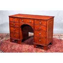 A MAHOGANY PEDESTAL DESK, LATE 18th CENTURY, the rectangular top with reeded rim above a central...