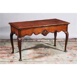 A MAHOGANY SIDE TABLE, IRISH, 19th CENTURY, with rectangular moulded top deep waved rim with a mo...
