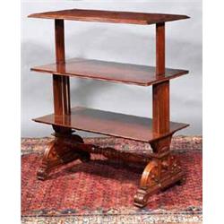 A MAHOGANY THREE TIER TELESCOPIC DUMB WAITER, MID 19th CENTURY, on gothic end supports and pilast...