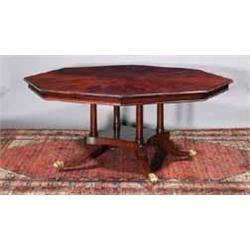 AN OCTAGONAL MAHOGANY PATENT DINING TABLE, 19th CENTURY, on four pillar central support with plat...