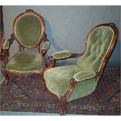 TWO SIMILAR WALNUT FRAMED PARLOUR CHAIRS, MID 19th CENTURY, shaped backs with carved crestings pa...