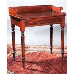 A MAHOGANY DRESSING TABLE, IRISH, c.1830, IN THE STYLE OF WILLIAMS AND GIBTON, with three quarter...