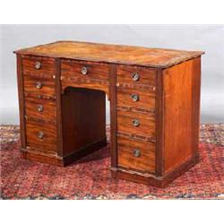 A SMALL MAHOGANY PEDESTAL DESK, c.1800, the top inset with leather, with central drawer four draw...