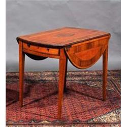 A SATINWOOD AND ROSEWOOD OVAL PEMBROKE TABLE, the top with an oval walnut inlay within a wide ros...