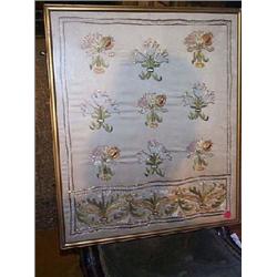 A FRAMED SILKWORK PANEL AND A CREWEL WORK PANEL....
