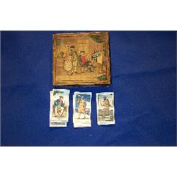 A PRINTED AND PAINTED CARDBOARD BOX GAME, CONTINENTAL, 18th CENTURY, depicting elegant figures in...