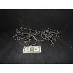 BARB WIRE SEVERAL FEET OF RUBBER SAFETY WIRE