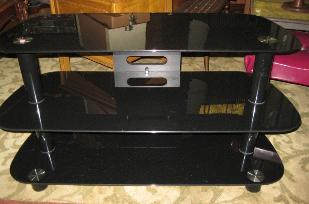 Black glass three tier entertainment center.