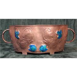 A Liberty & Co English Pewter Art Nouveau twin handled shaped bowl with applied turquoise enamel...