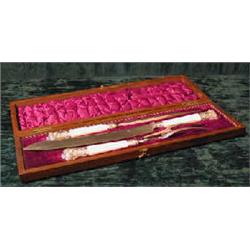 A fine 19th century mahogany cased carving set with hallmarked silver mounts and ivory handles (...