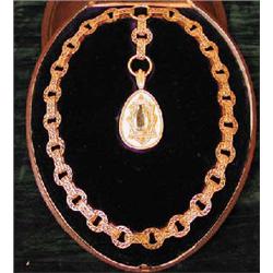 A fine Victorian pierced gold necklace with impressive aquamarine inset gold pendant, in origina...