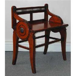 A fine late Victorian hall seat in the Regency manner, with brass galleried back, makers Jas Sho...