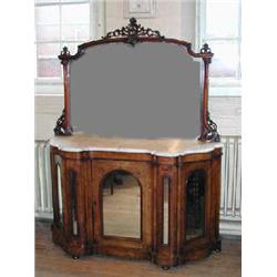 A good Victorian inlaid walnut credenza with mirror back above serpentine marble top and three m...