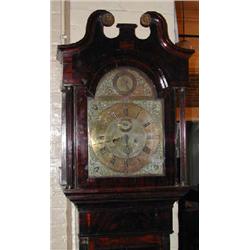 An oak and mahogany cased eight day longcase clock with arched brass dial signed H Walker, Londo...