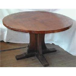 School of Robert "Mouseman" Thompson; A large oak circular pedestal table with carved squirrel t...