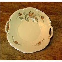 Cake platter with pierced ears and flower decor. From Porsgrund in Norway. Diam 24 cm. NOK 500,-...