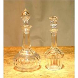 2 decanters with cut glass decor. H 28 and 25 cm. NOK 500,-...