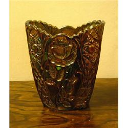 Vase of luster glass with geometric and flower decor. H 20 cm. NOK 400,-...