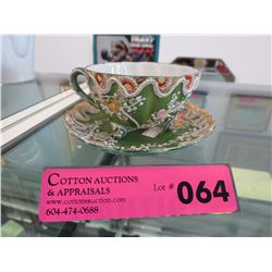 Vintage teacup and saucer - raised design