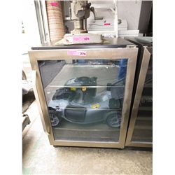 Glass front bar fridge.