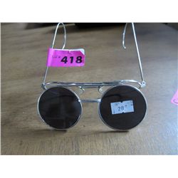 Vintage pair of bi-fold sunglasses double lenses