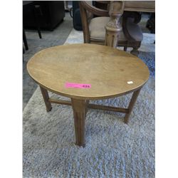 Wooden oval coffee table 24" x 19" x 18"