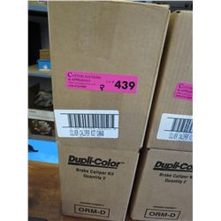 2 boxes containing brake caliper kits