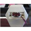 Image 1 : 10kt Yellow Gold ring with 3 Garnets