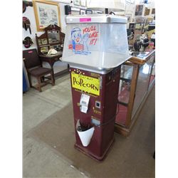Vintage coin operated popcorn dispenser
