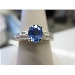 Ladies .71 carat lively blue sapphire ring
