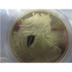 Gold layered 2013 US Walking Liberty round