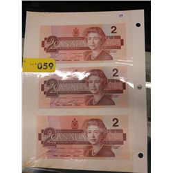 3 uncirculated Canada $2 bills