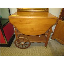 Rolling tea trolley with drop down sides